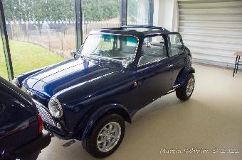 Elongated Mini - and with Ford running gear, so rear wheel drive!